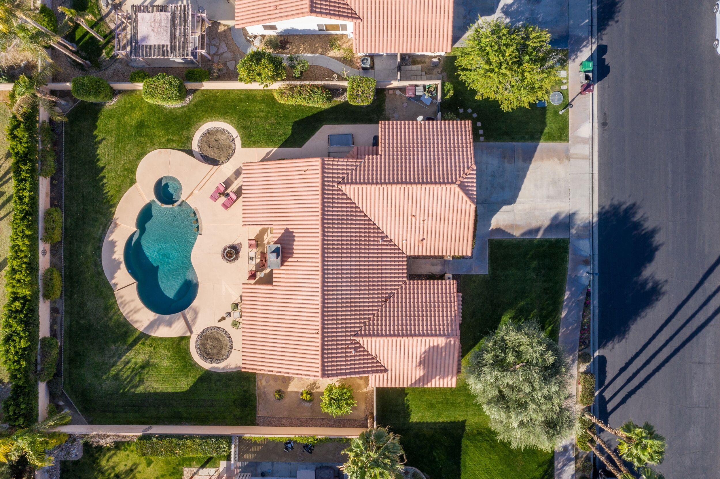 39795 Regency Way Palm Desert, CA 92211 - Photo 34 of 39 an aerial view of a house with garden space and street view