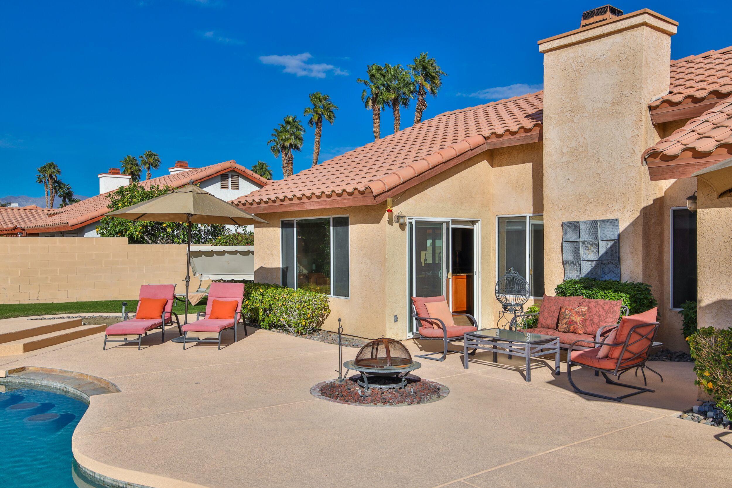 39795 Regency Way Palm Desert, CA 92211 - Photo 35 of 39 a view of a chairs and tables in patio