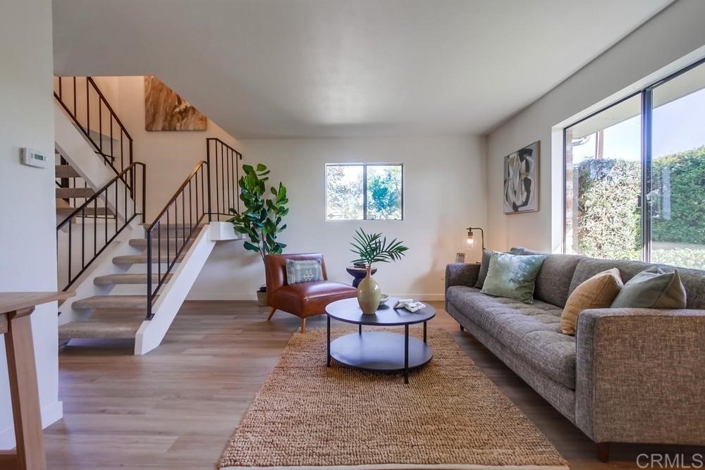 11941 Royal Road, Unit A El Cajon, CA 92021 - Photo 7 of 28 a living room with furniture and a potted plant