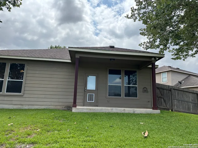 a house view with a garden space