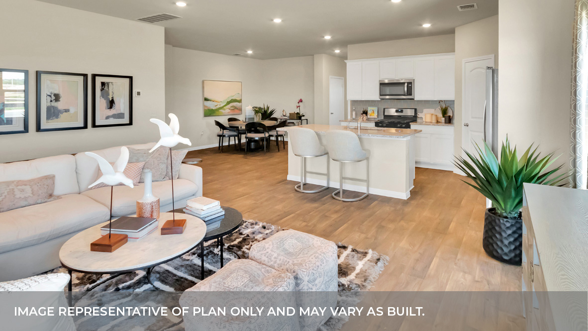 1905 Gold Dust Trail Leander, TX 78641 - Photo 16 of 28 a living room with furniture kitchen view and a potted plant