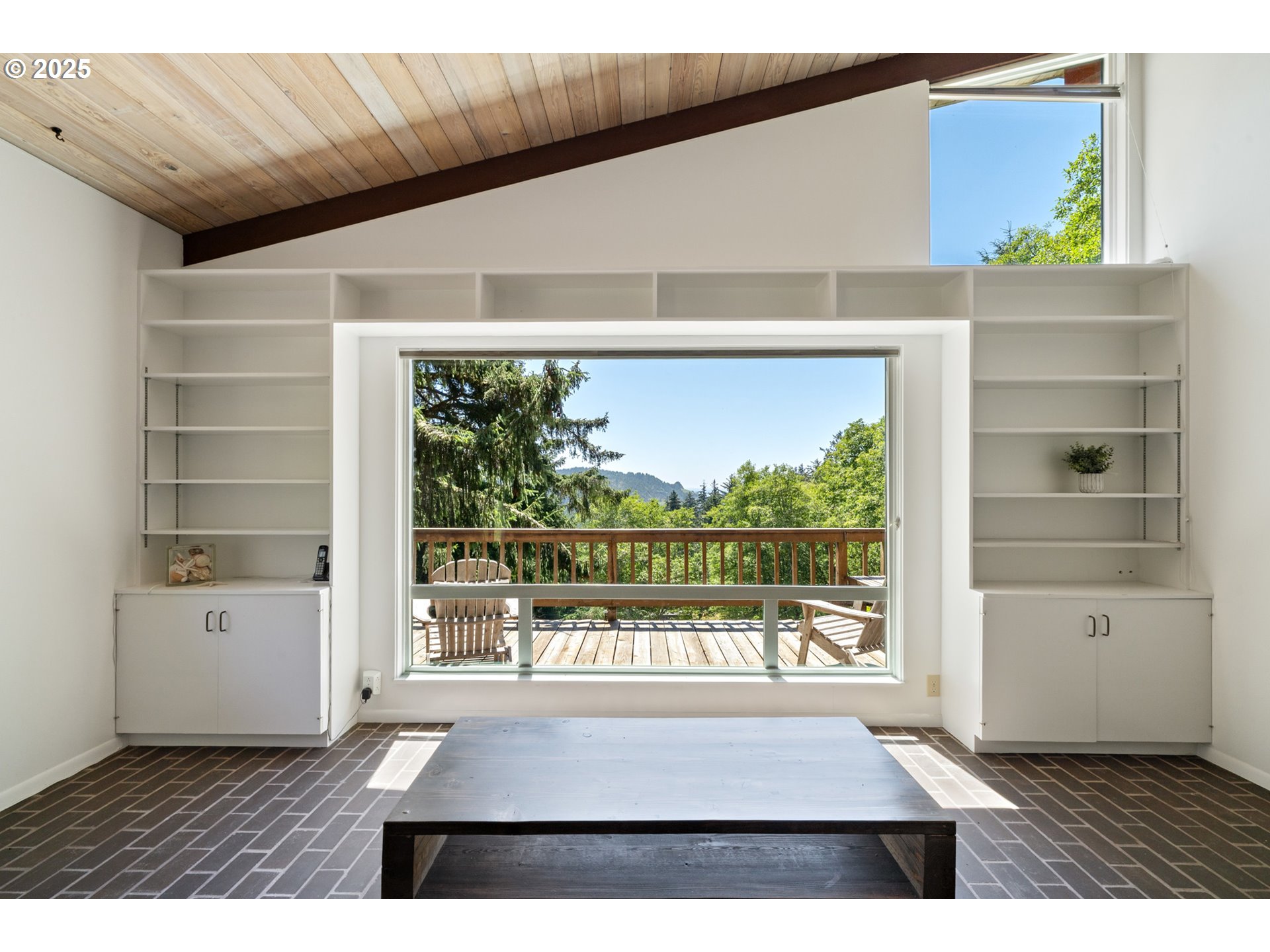 56100 High Point Road Otis, OR 97368 - Photo 12 of 47 a view of an empty room with a window