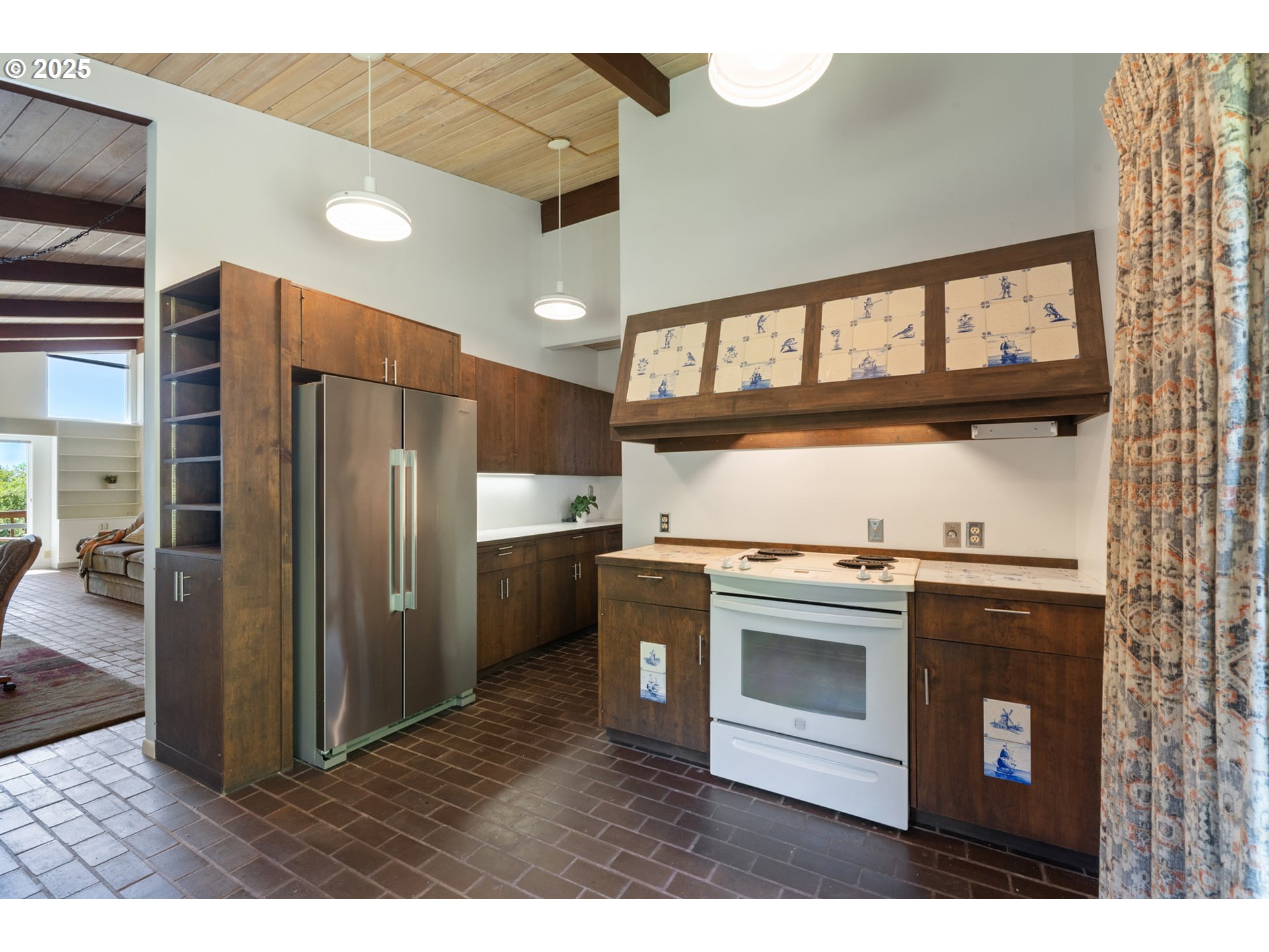 56100 High Point Road Otis, OR 97368 - Photo 20 of 47 a kitchen with stainless steel appliances granite countertop a stove a refrigerator and a sink
