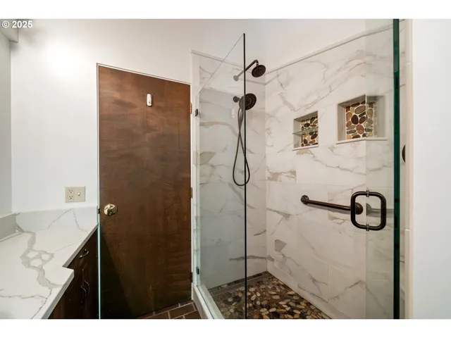 a kitchen with a stove a sink and a microwave