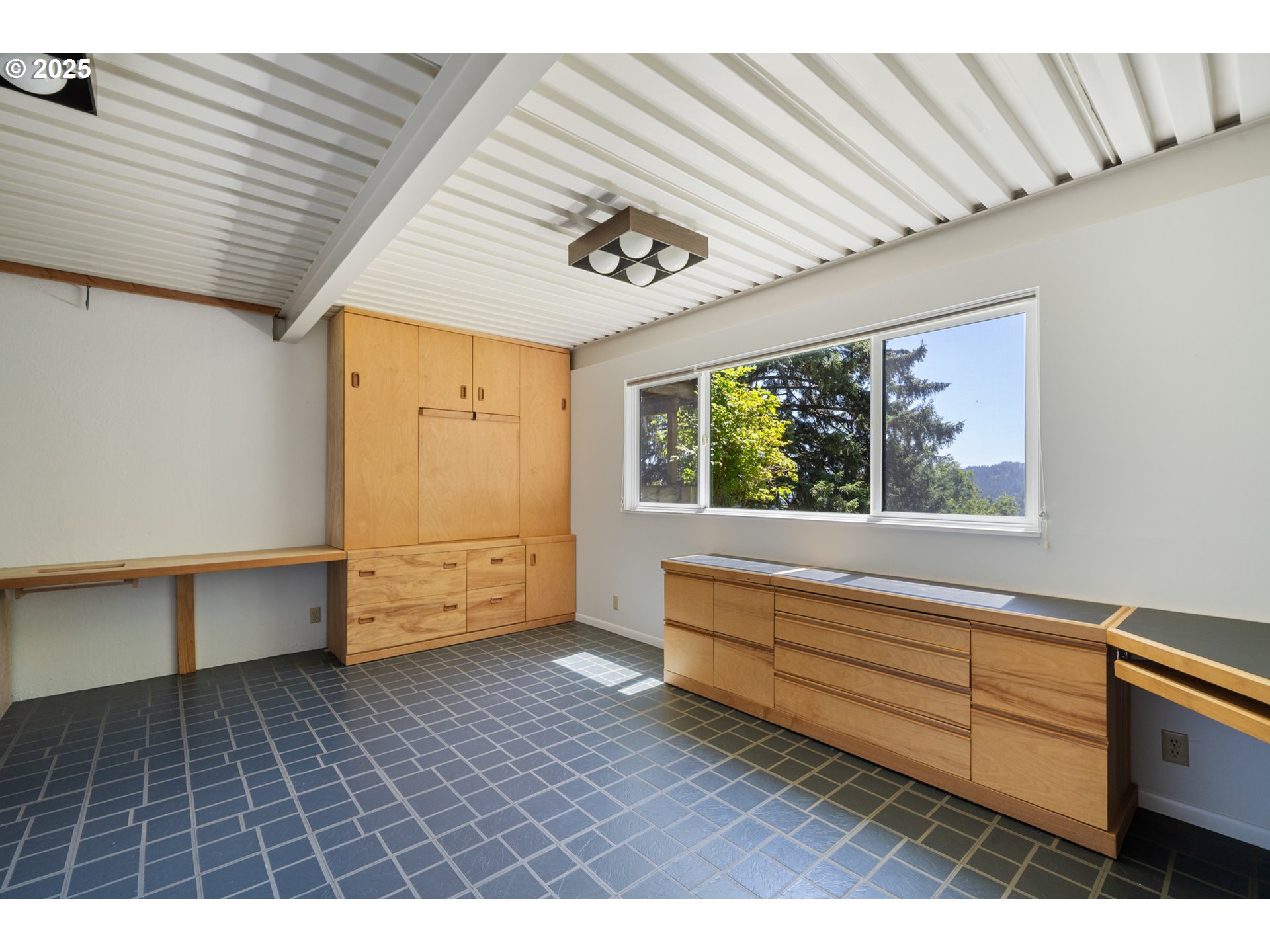 56100 High Point Road Otis, OR 97368 - Photo 33 of 47 a view of an empty room with a window