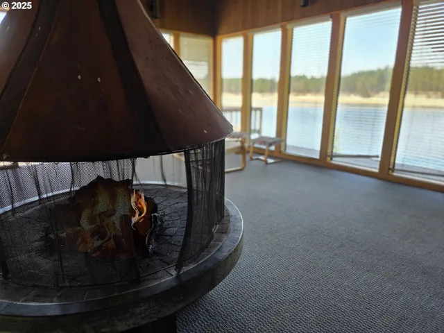 a view of a backyard with a lake view