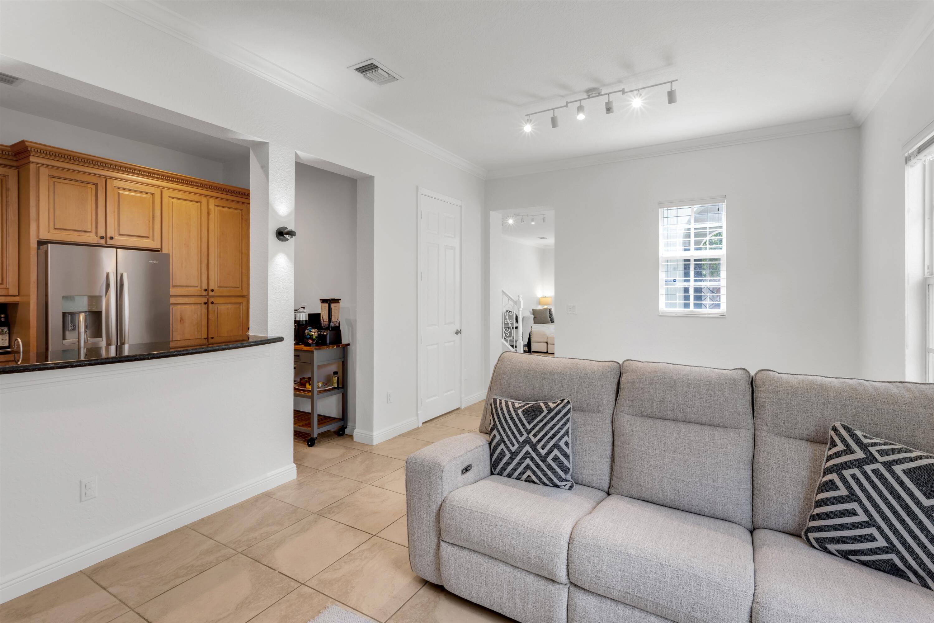 8300 Northwest 9th Avenue Boca Raton, FL 33487 - Photo 6 of 23 SITTING_ROOM_ANGLE_OUT