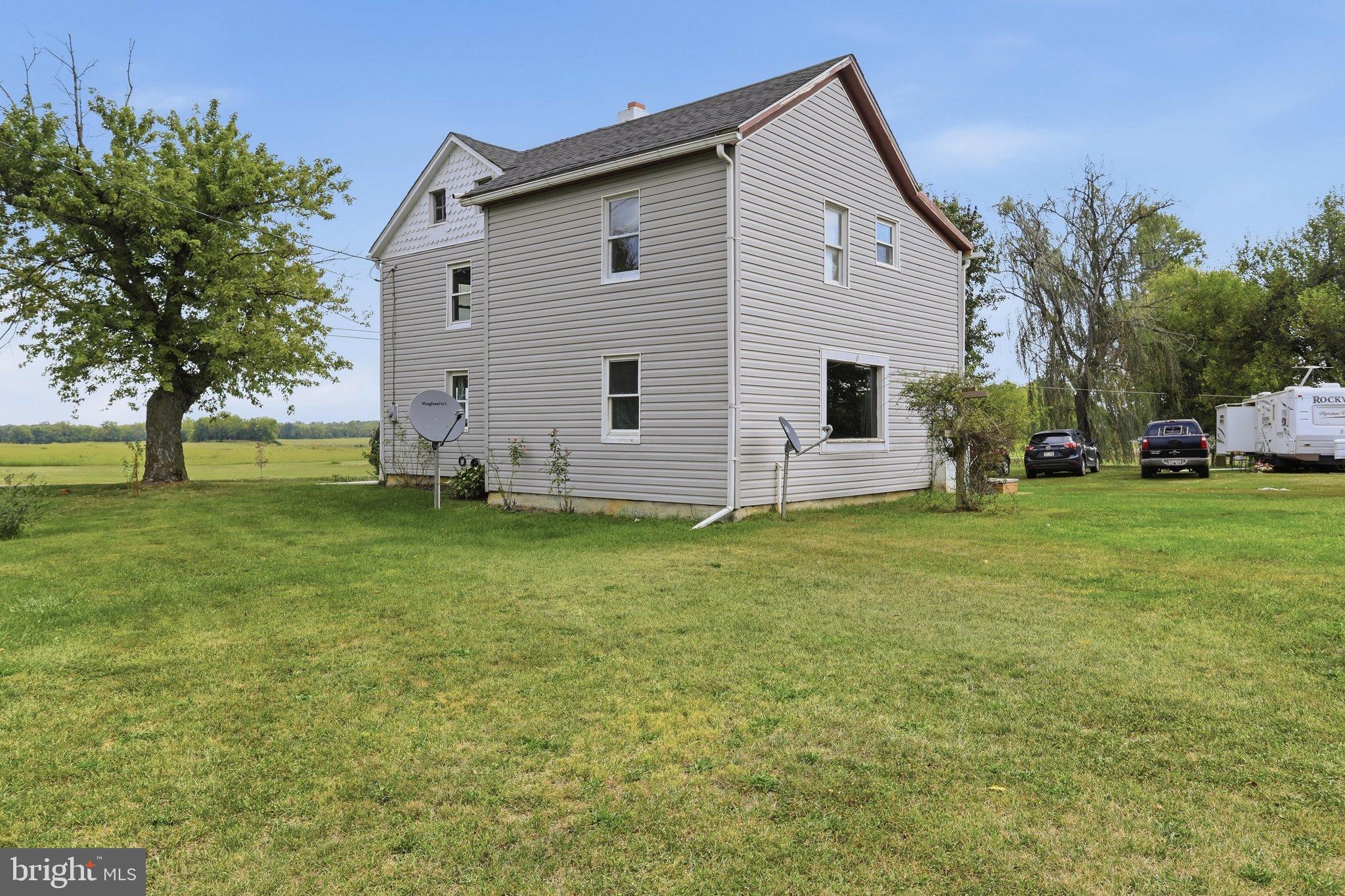 4651 Leetown Road Summit Point, WV 25446 - Photo 24 of 28 Charming home with expansive green surroundings.
