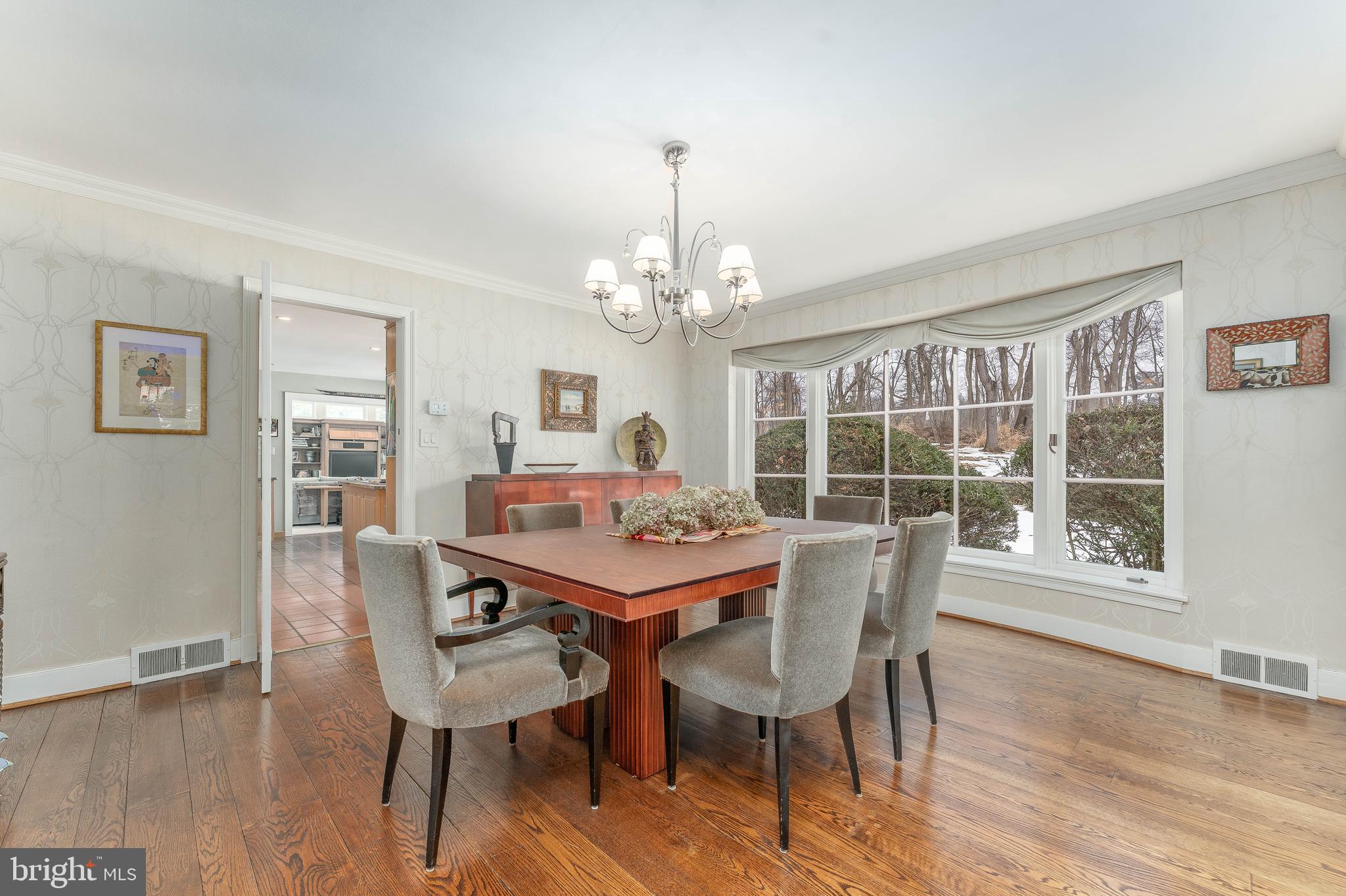 249 Bell Road Wynnewood, PA 19096 - Photo 12 of 76 a view of a dining room with furniture wooden floor and chandelier