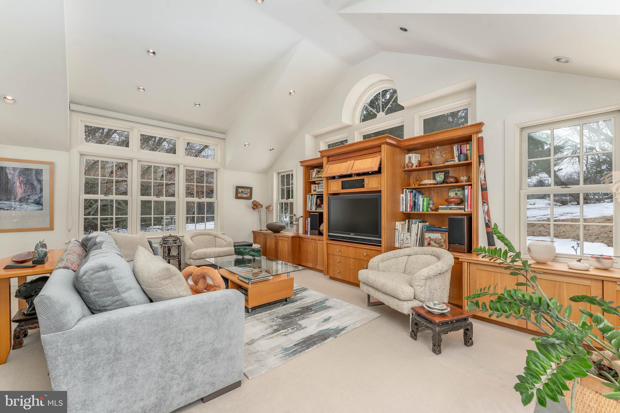 249 Bell Road Wynnewood, PA 19096 - Photo 23 of 76 a living room with furniture and a floor to ceiling window