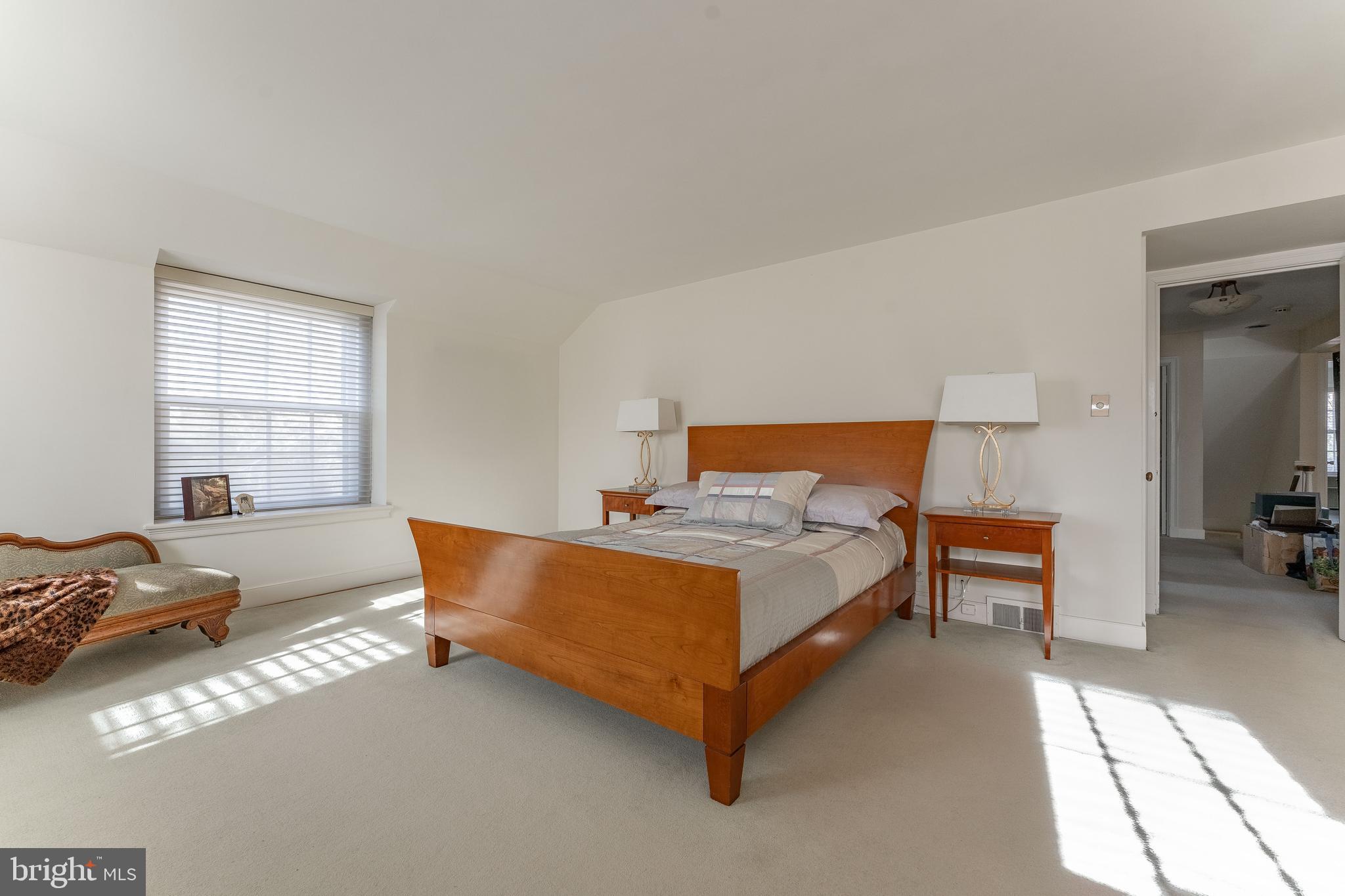 249 Bell Road Wynnewood, PA 19096 - Photo 34 of 76 a bed room with a bed and a chair