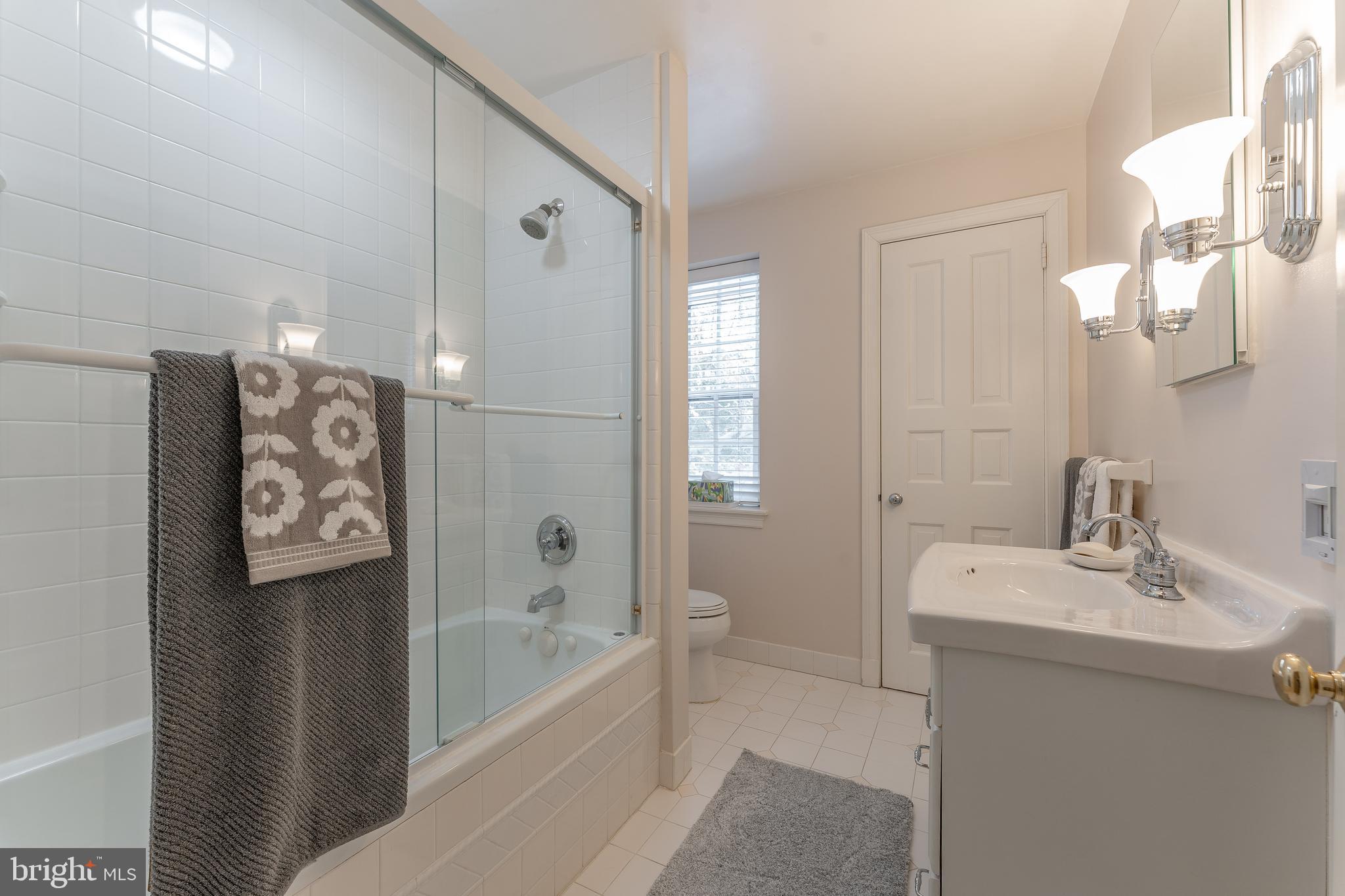 249 Bell Road Wynnewood, PA 19096 - Photo 50 of 76 a bathroom with a bathtub and a sink