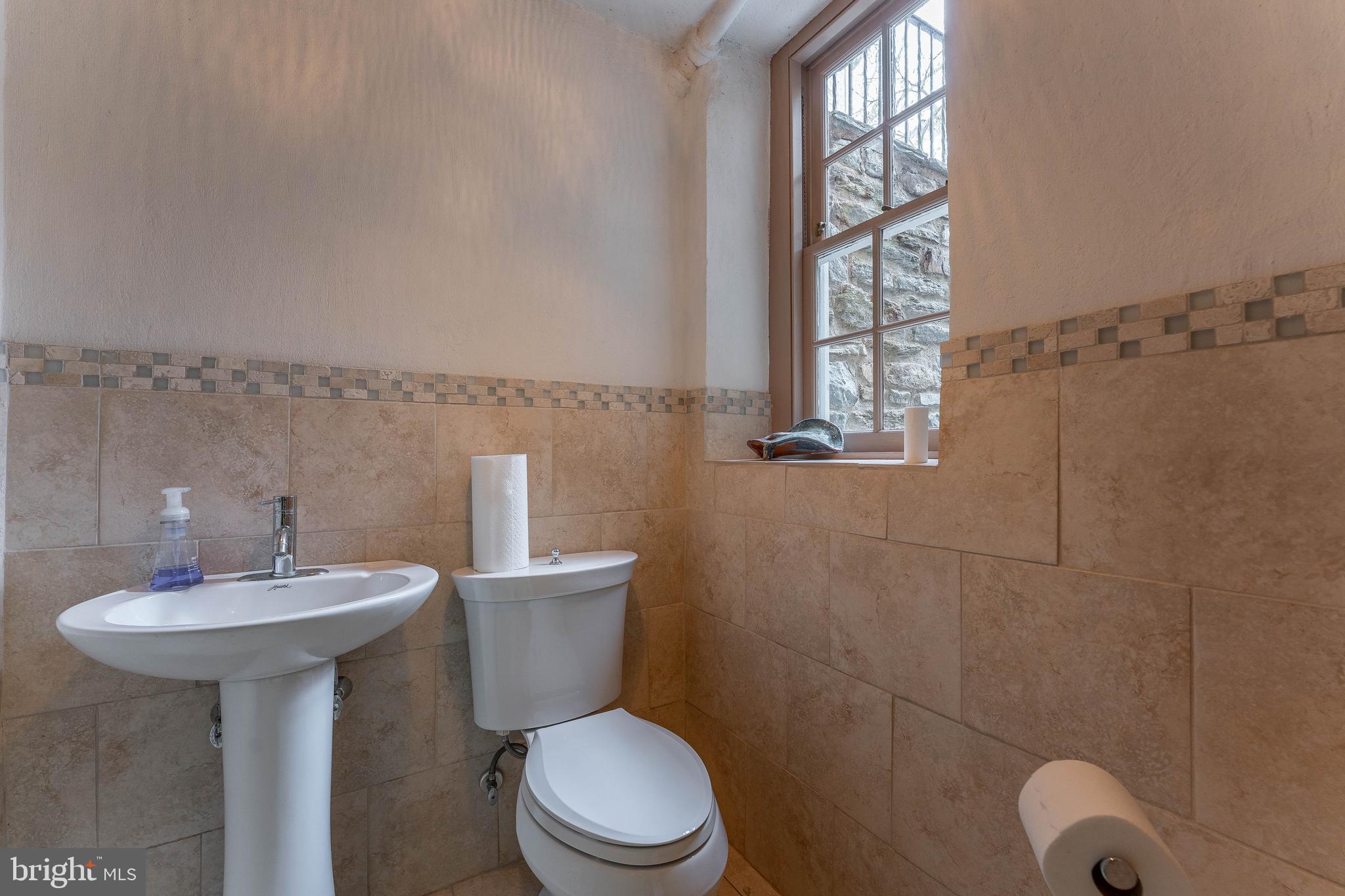 249 Bell Road Wynnewood, PA 19096 - Photo 55 of 76 a bathroom with a sink a toilet and shower