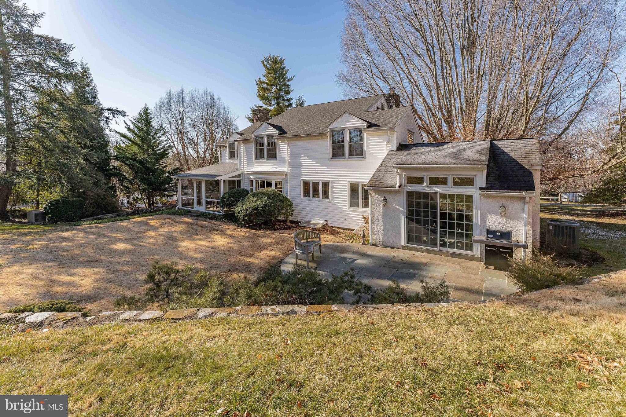 249 Bell Road Wynnewood, PA 19096 - Photo 65 of 76 a view of a white house with a yard