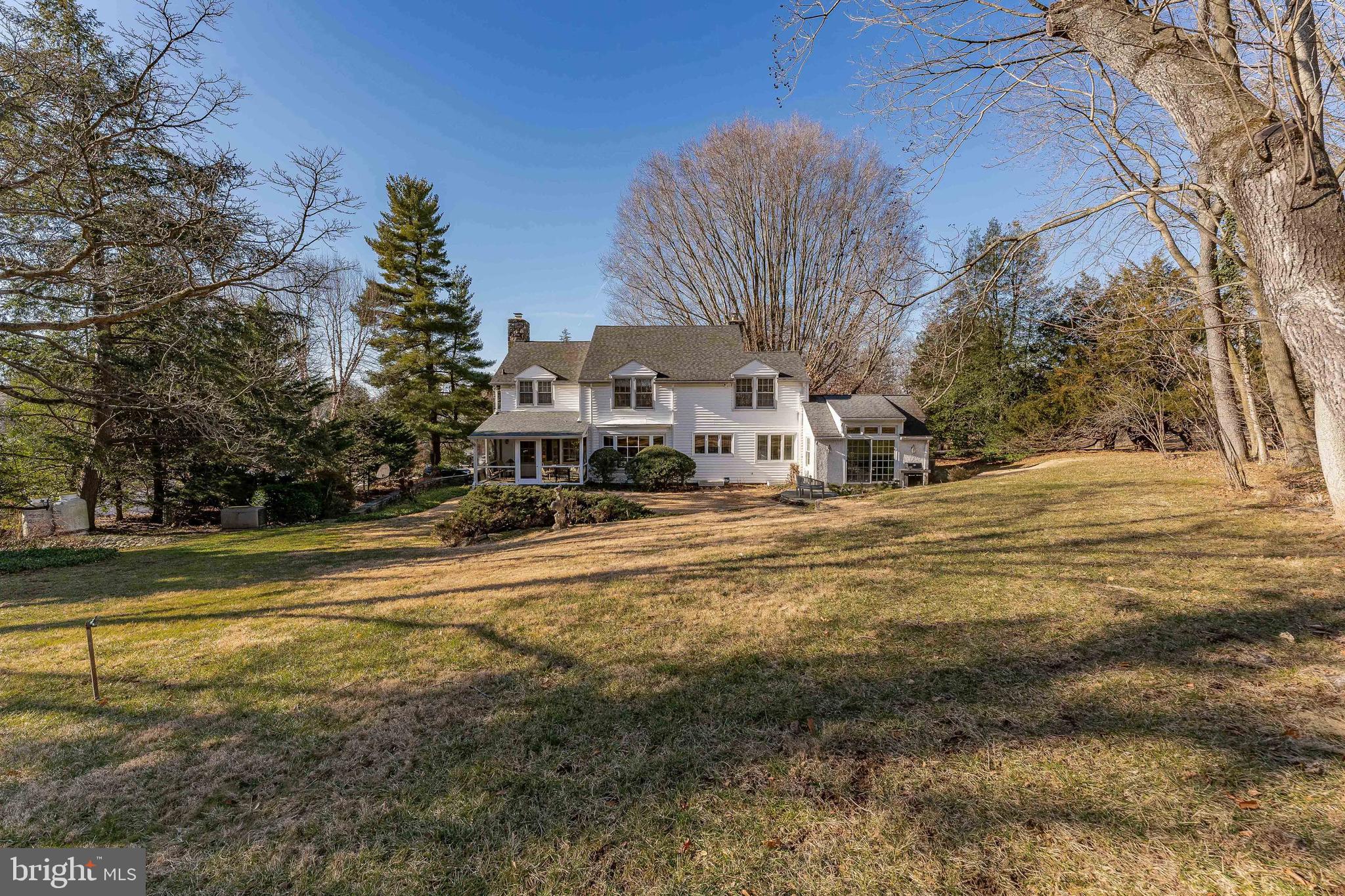 249 Bell Road Wynnewood, PA 19096 - Photo 69 of 76 a front view of residential houses with yard and trees