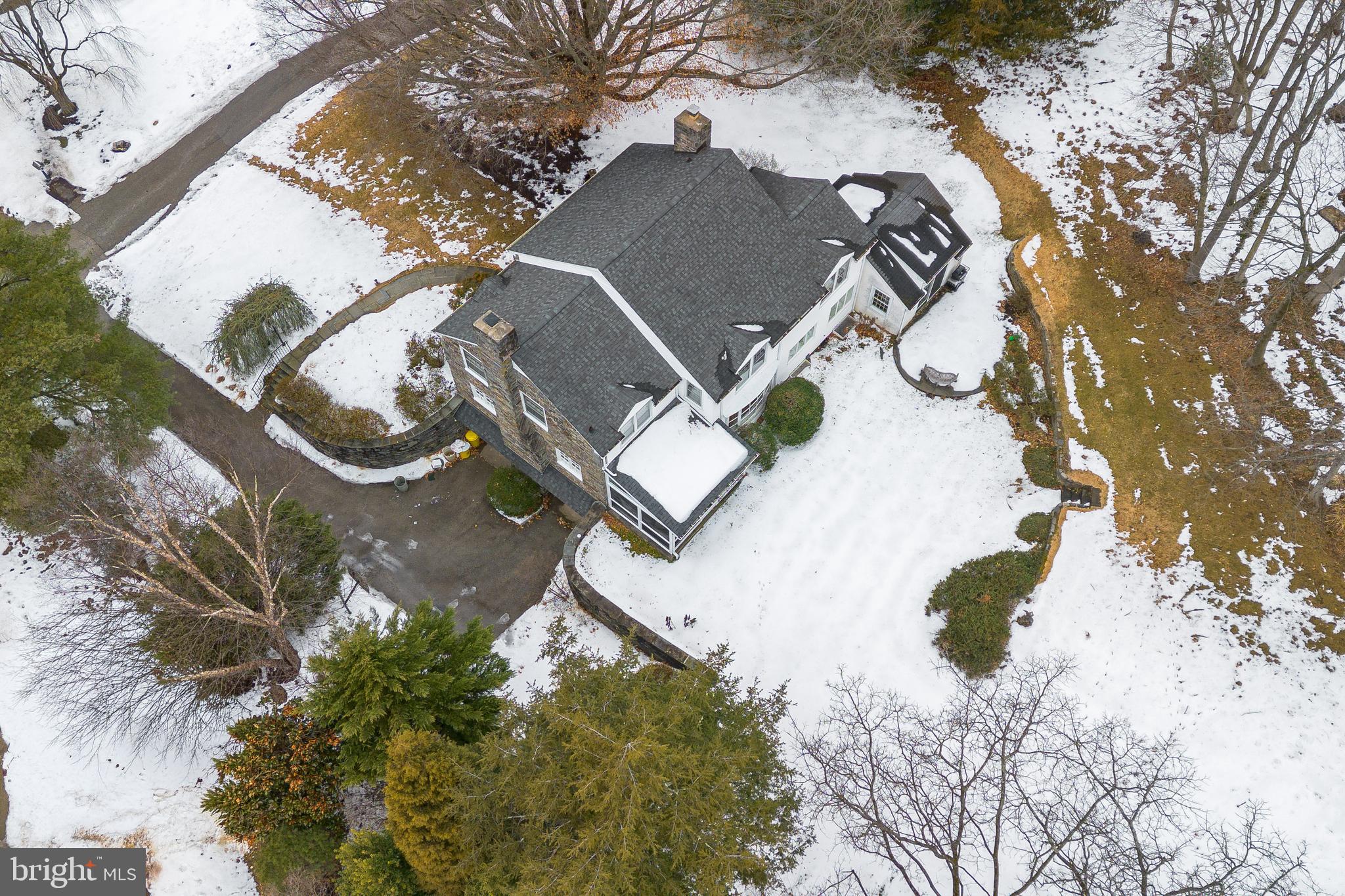 249 Bell Road Wynnewood, PA 19096 - Photo 72 of 76 an aerial view of a house with a yard and greenery space