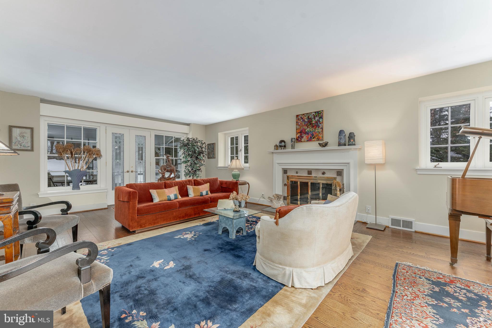 249 Bell Road Wynnewood, PA 19096 - Photo 8 of 76 a living room with furniture and a fireplace