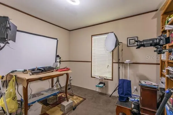 a room with furniture and gym equipment