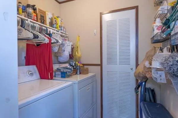 a bedroom with a bed and a dresser in it