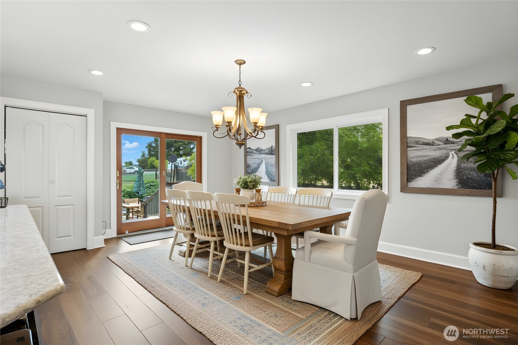 371 Hill Road Walla Walla, WA 99362 - Photo 22 of 40 a view of a dining room with furniture window and wooden floor