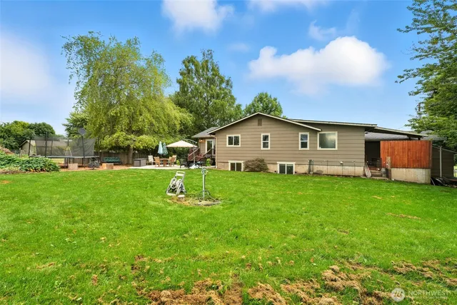 a picture of a bathroom with a shower