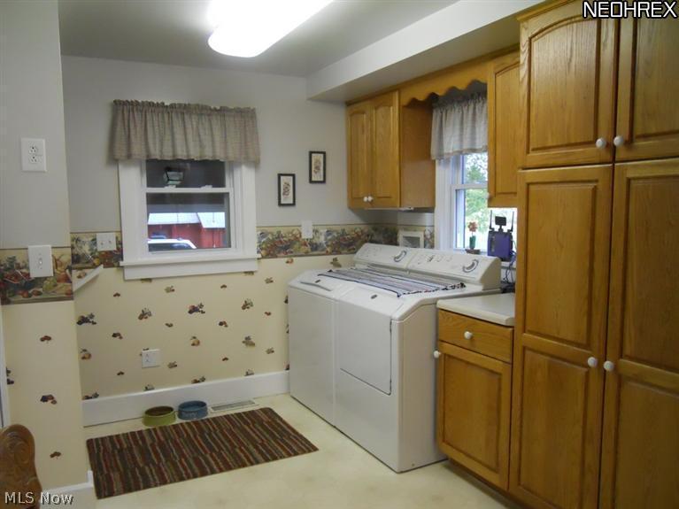 17540 Kinsman Road Middlefield, OH 44062 - Photo 5 of 16 1st floor laundry rear with lots of light and storage