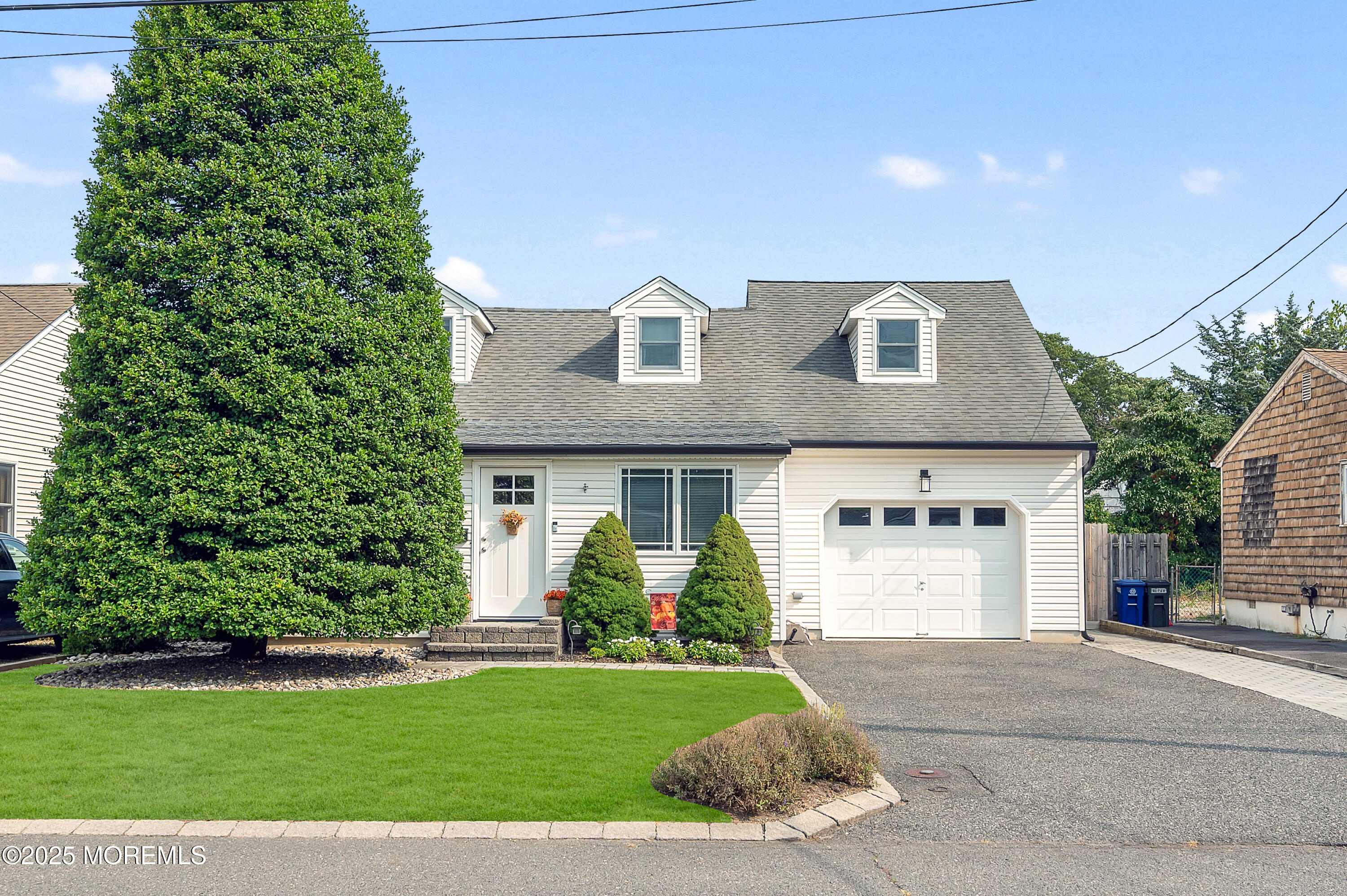 2121 Foster Road Point Pleasant, NJ 08742 - Photo 3 of 47 a front view of a house with a yard
