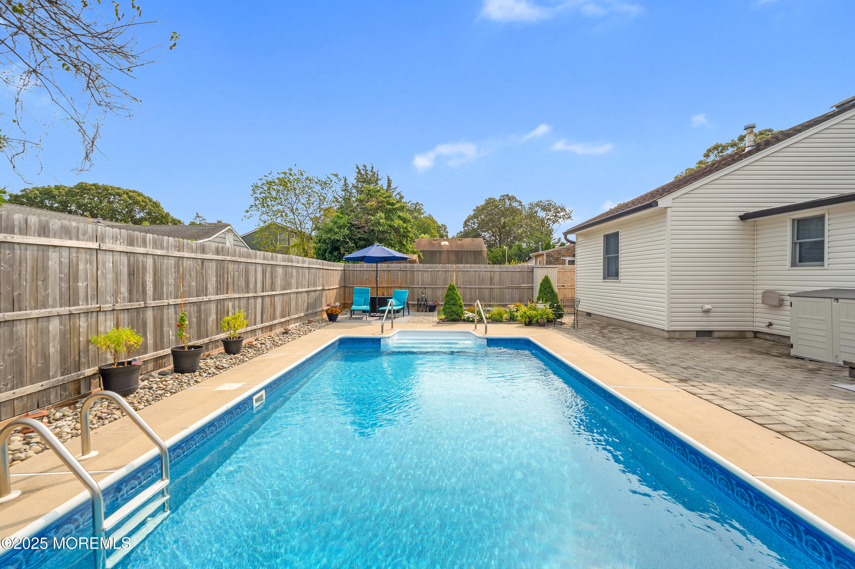 2121 Foster Road Point Pleasant, NJ 08742 - Photo 33 of 47 a view of a backyard with swimming pool
