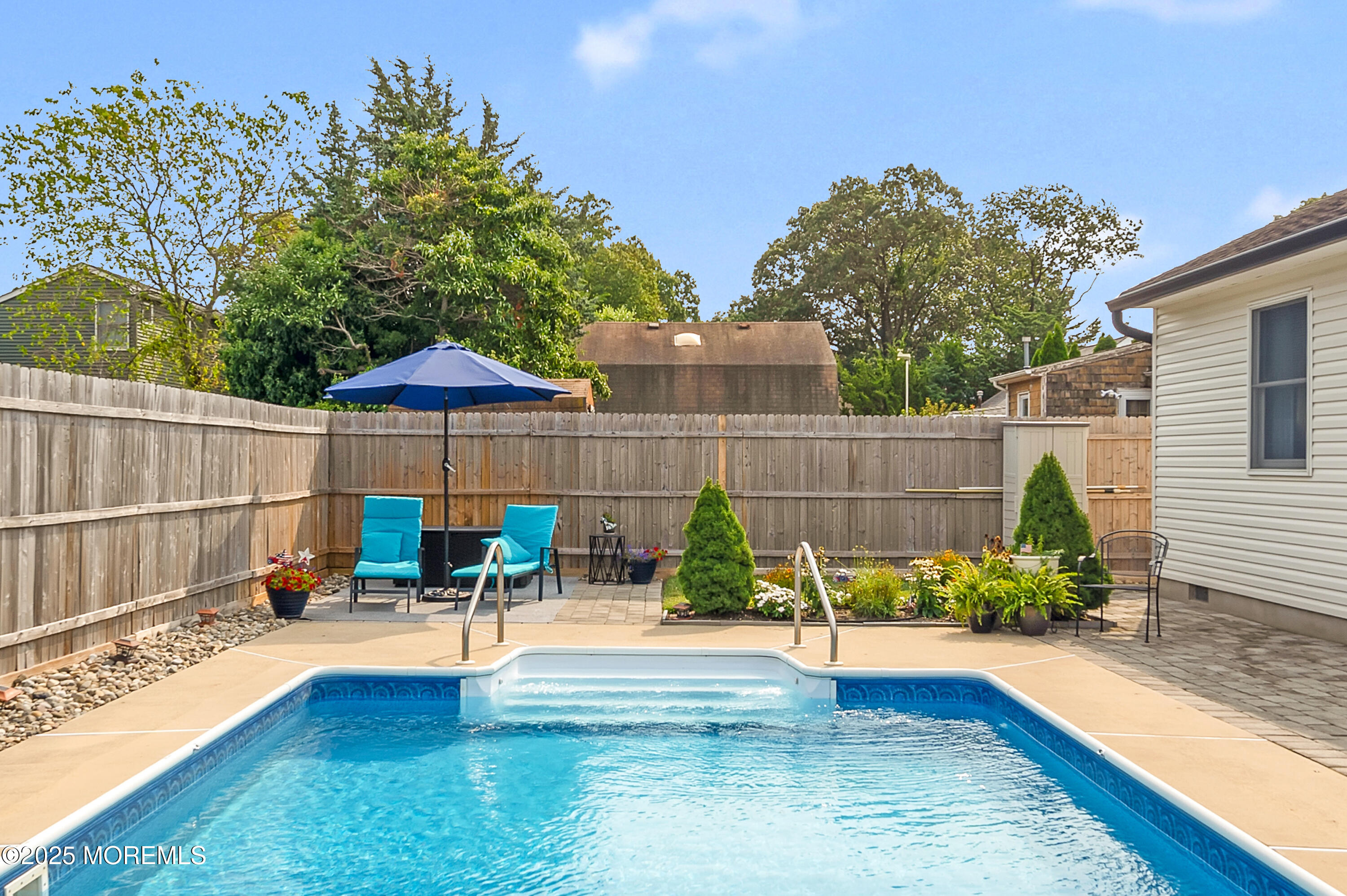2121 Foster Road Point Pleasant, NJ 08742 - Photo 34 of 47 a view of a backyard with a patio