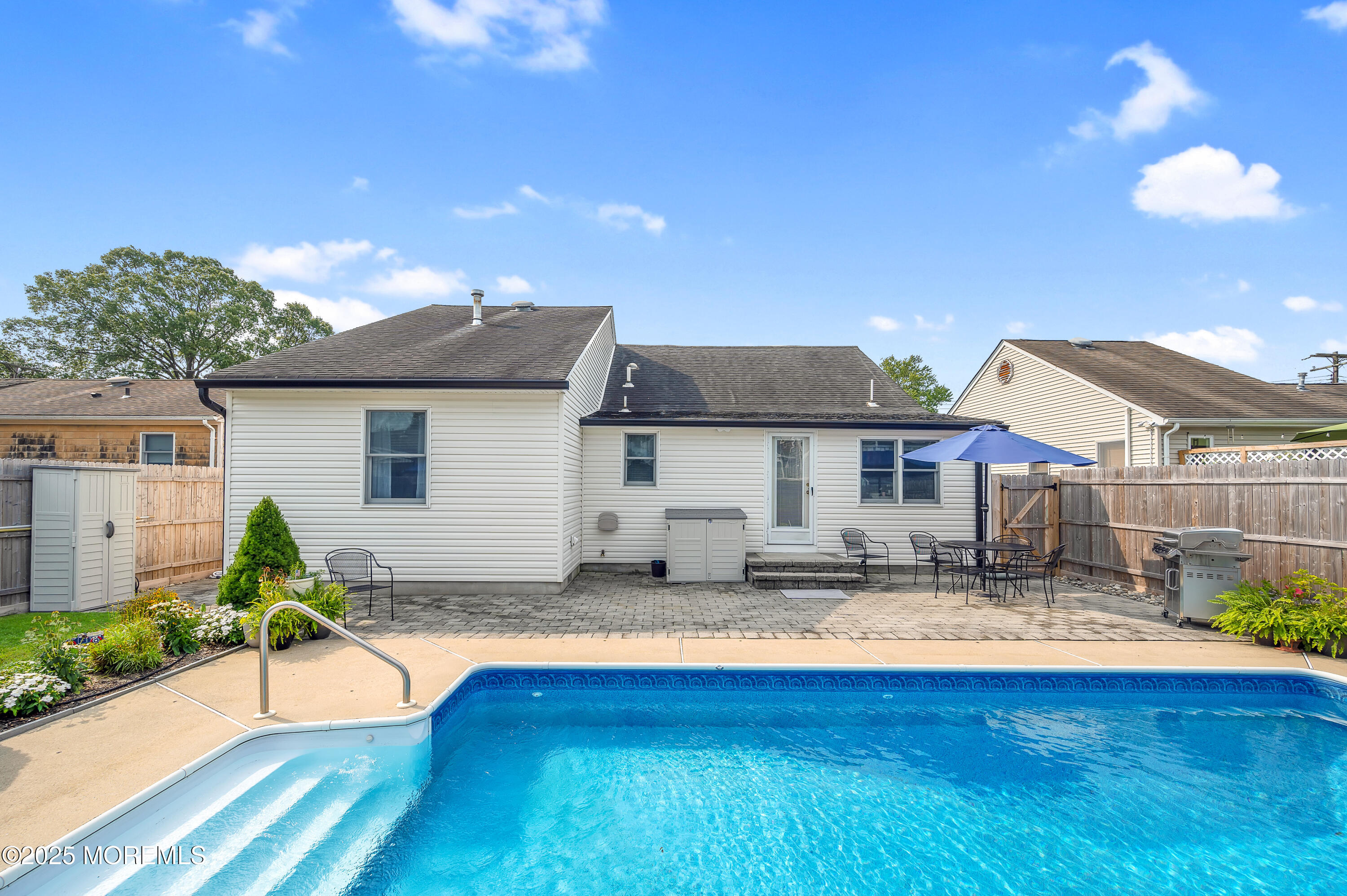2121 Foster Road Point Pleasant, NJ 08742 - Photo 41 of 47 a swimming pool view with a seating space