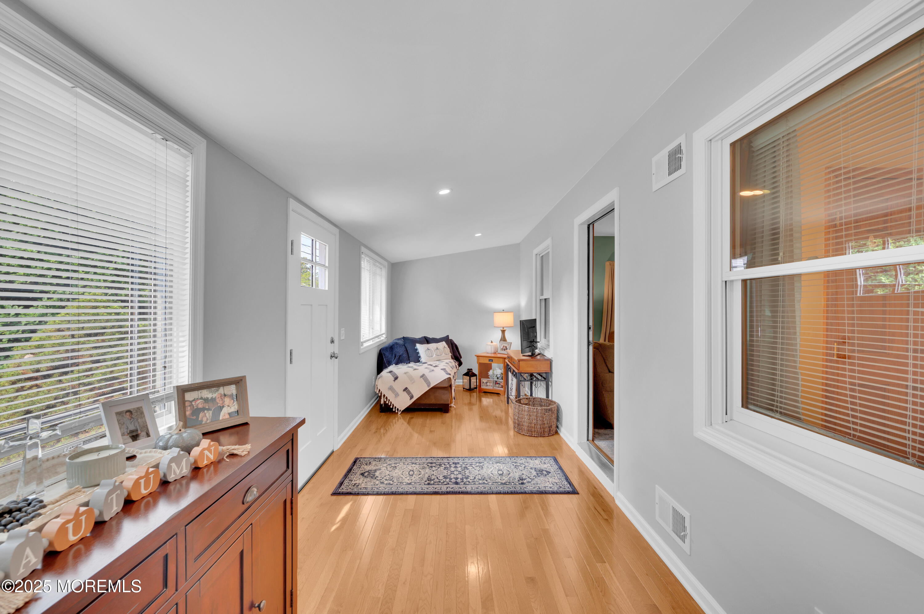 2121 Foster Road Point Pleasant, NJ 08742 - Photo 5 of 47 a living room with furniture and a large window