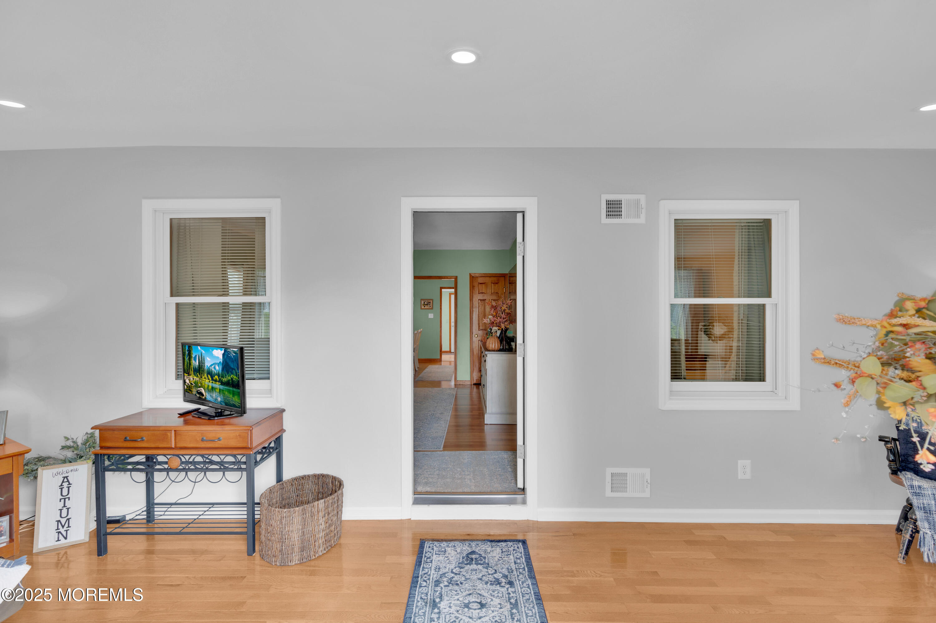 2121 Foster Road Point Pleasant, NJ 08742 - Photo 6 of 47 a living room with furniture and a window