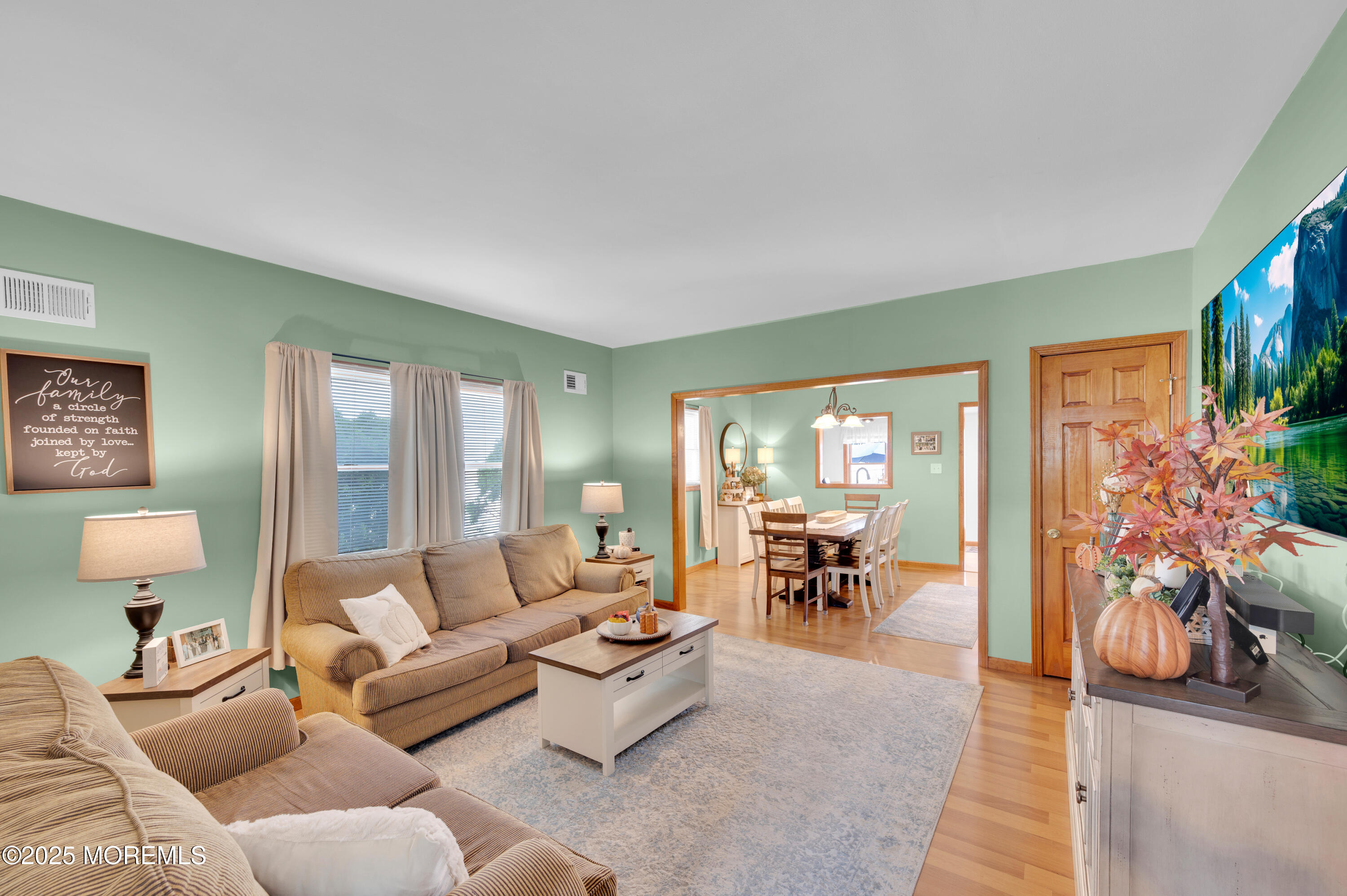 2121 Foster Road Point Pleasant, NJ 08742 - Photo 7 of 47 a living room with furniture and a large window