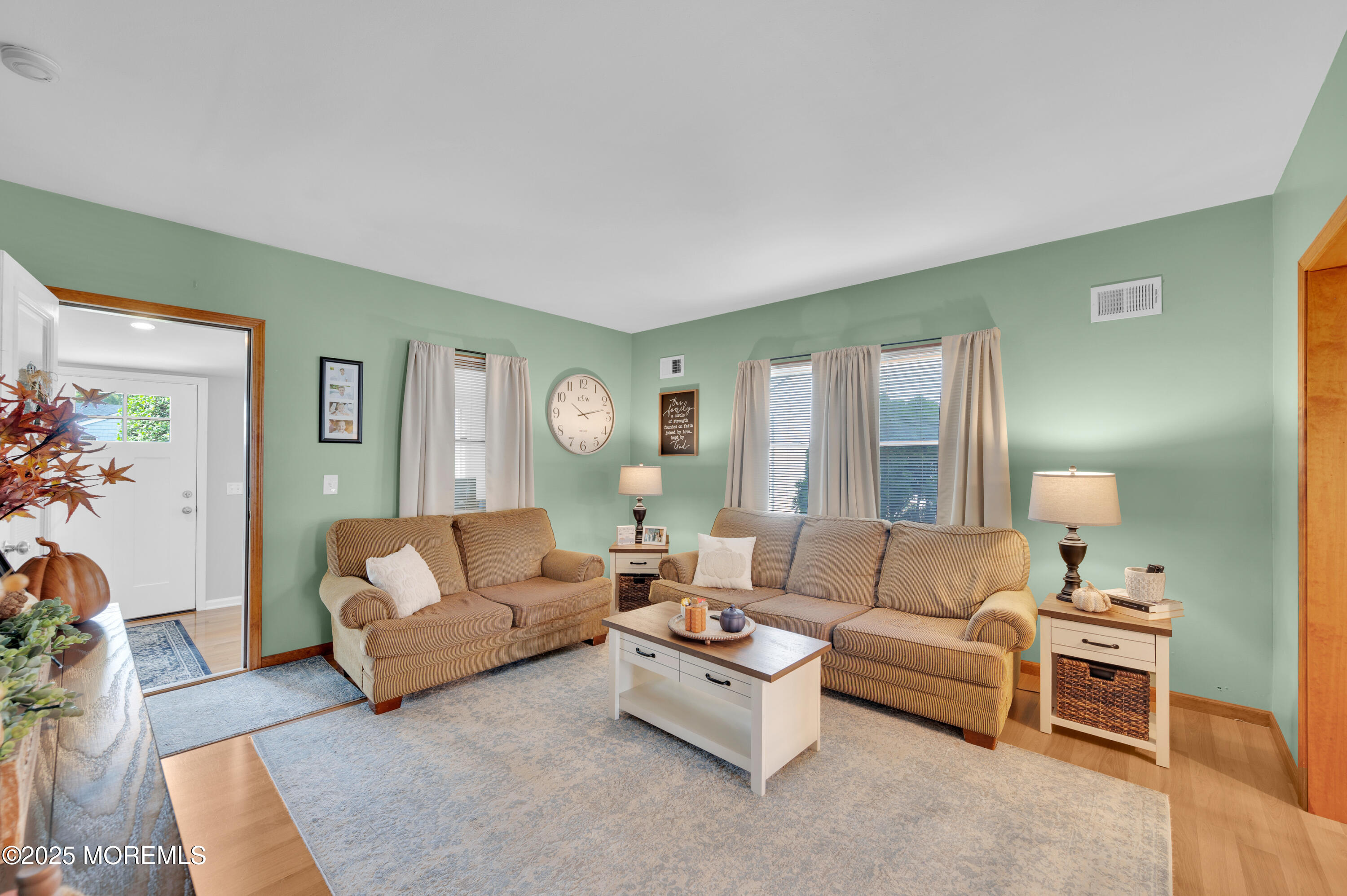 2121 Foster Road Point Pleasant, NJ 08742 - Photo 8 of 47 a living room with furniture and a large window
