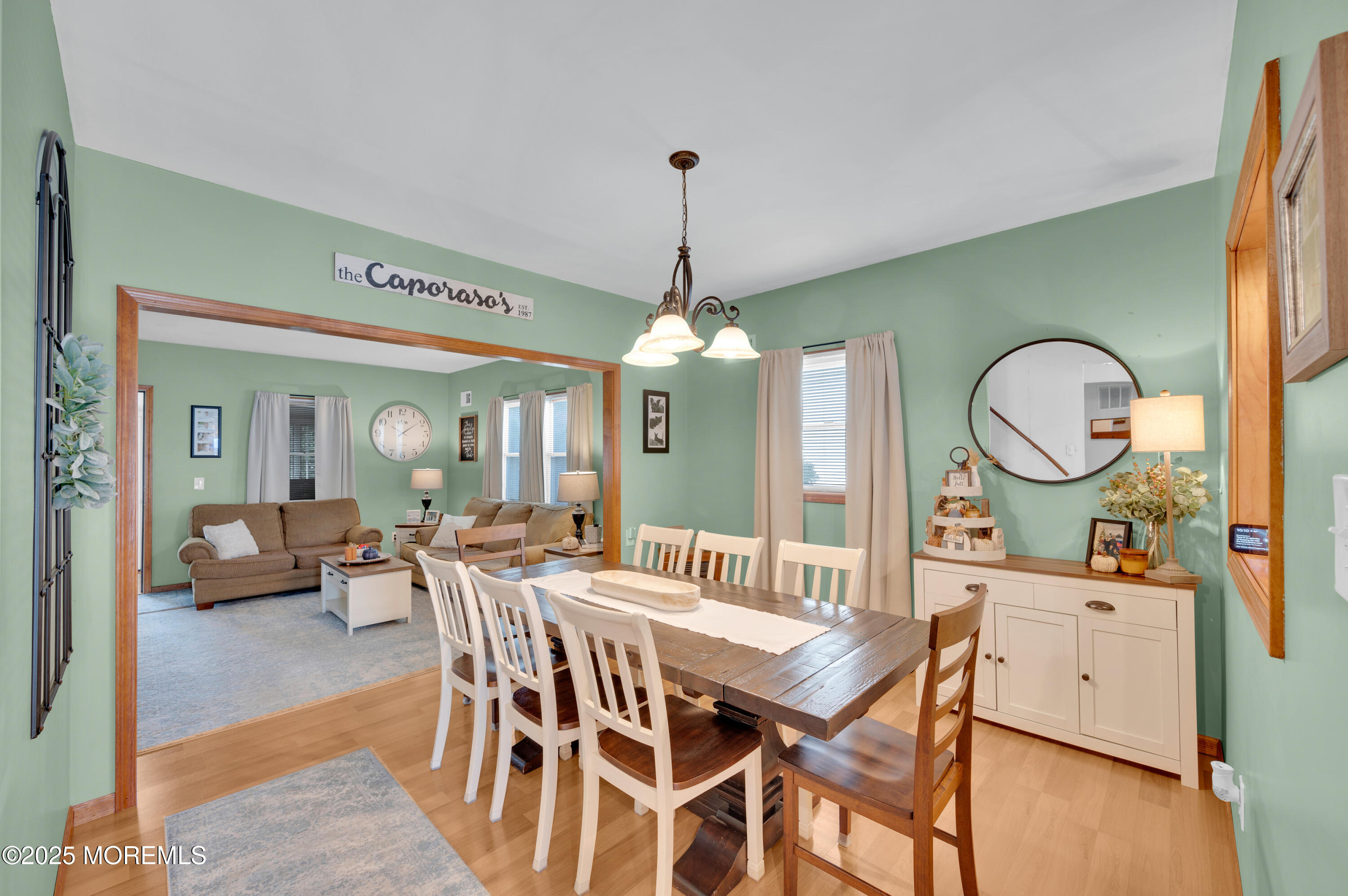 2121 Foster Road Point Pleasant, NJ 08742 - Photo 9 of 47 a view of a dining room with furniture and wooden floor