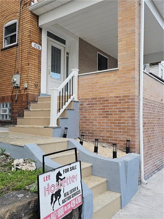 516 Jackson Street Rochester, PA 15074 - Photo 2 of 30 a view of a house with couches