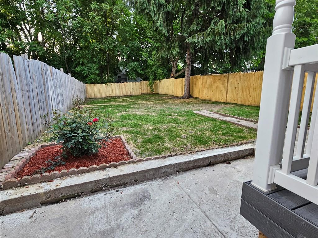 516 Jackson Street Rochester, PA 15074 - Photo 5 of 30 a garden view with a seating space