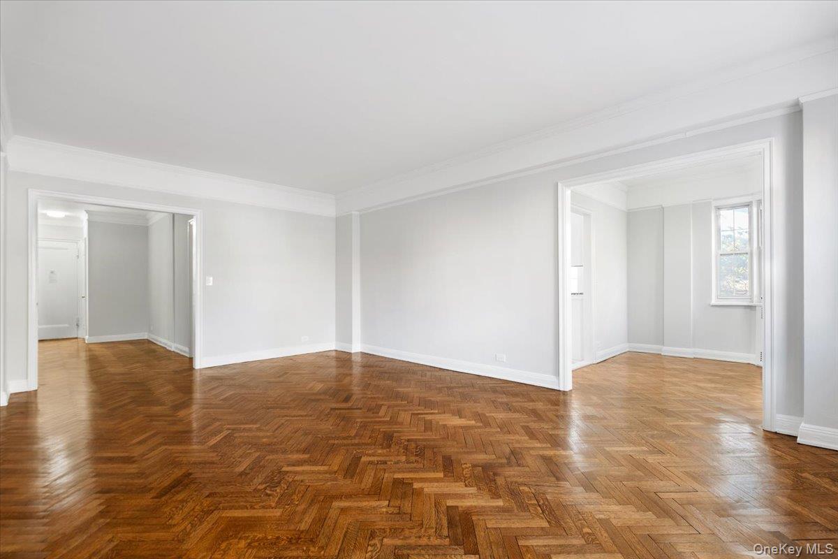 45 Popham Road, Unit 1E Scarsdale, NY 10583 - Photo 2 of 24 a view of an empty room and window