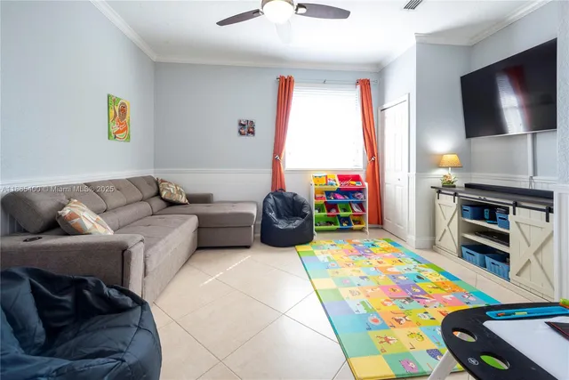 a view of a white house with a swimming pool