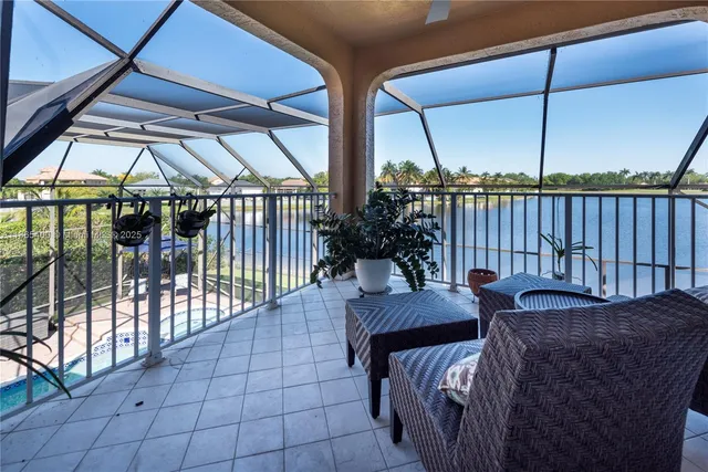 an aerial view of lake and city