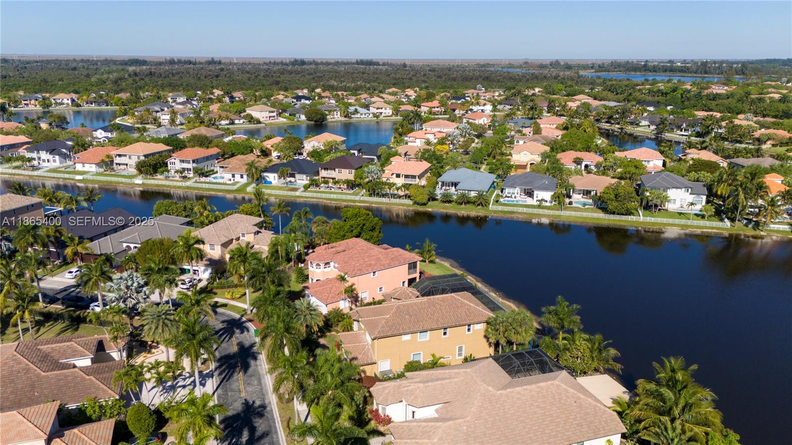 18991 Southwest 32nd Street Miramar, FL 33029 - Photo 60 of 98 an aerial view of residential houses with outdoor space
