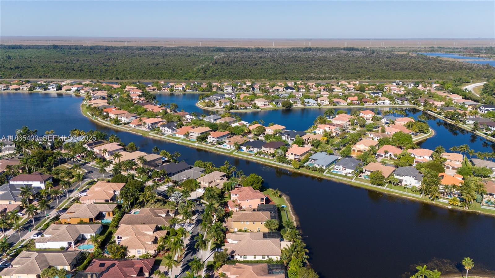 18991 Southwest 32nd Street Miramar, FL 33029 - Photo 74 of 98 an aerial view of ocean and residential houses with outdoor space