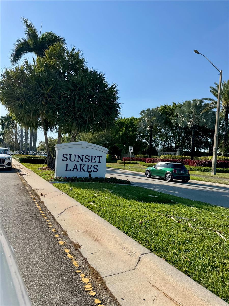 18991 Southwest 32nd Street Miramar, FL 33029 - Photo 91 of 98 a view of a park with of a house in the background