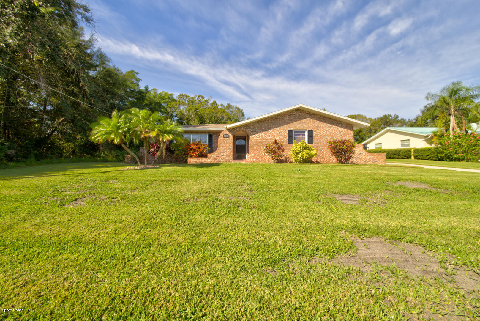1030 Sunswept Road Northeast Palm Bay, FL 32905 - Photo 1 of 39 FRONT
