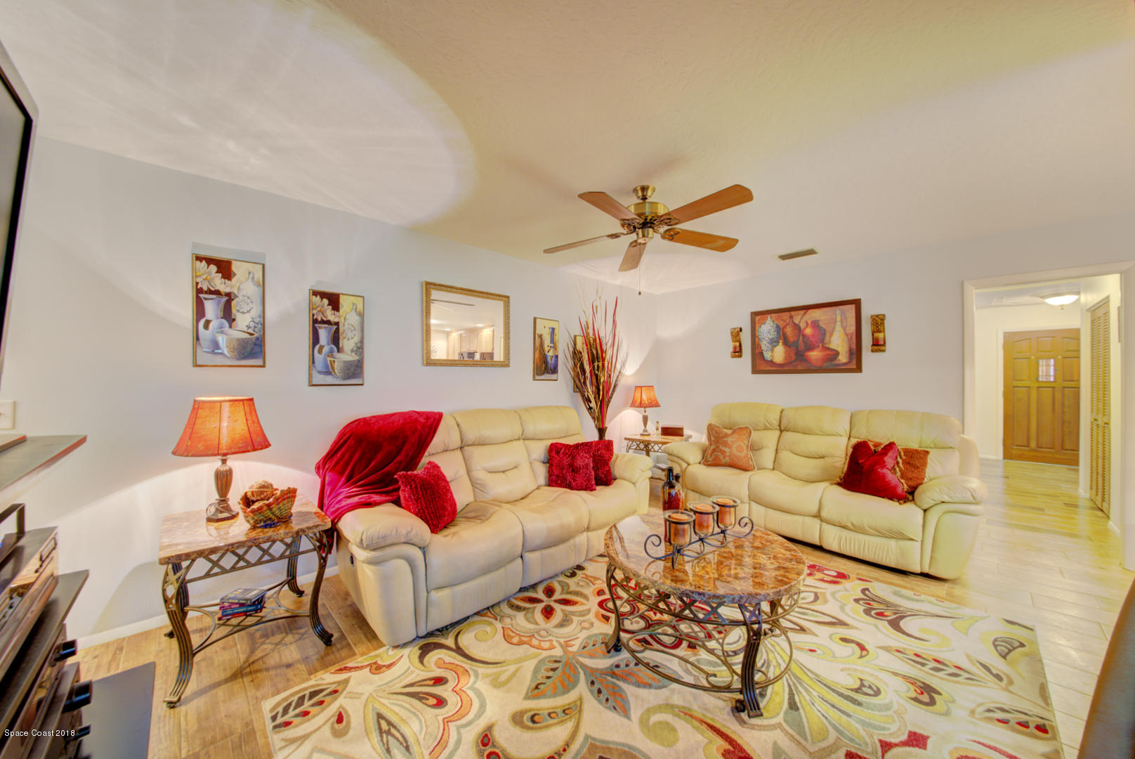 1030 Sunswept Road Northeast Palm Bay, FL 32905 - Photo 13 of 39 family room with view to front door