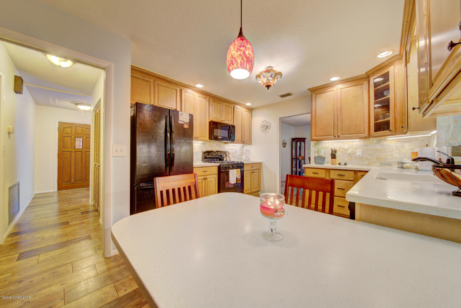 1030 Sunswept Road Northeast Palm Bay, FL 32905 - Photo 16 of 39 kitchen with breakfast bar