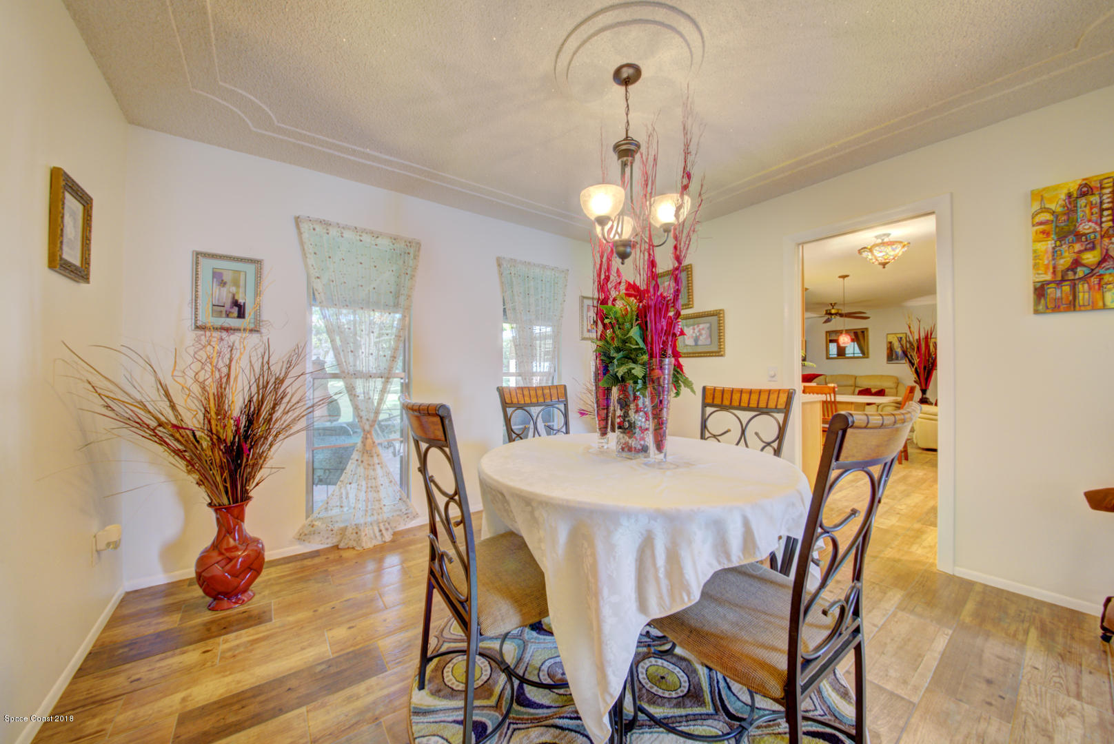 1030 Sunswept Road Northeast Palm Bay, FL 32905 - Photo 19 of 39 dining room off kitchen