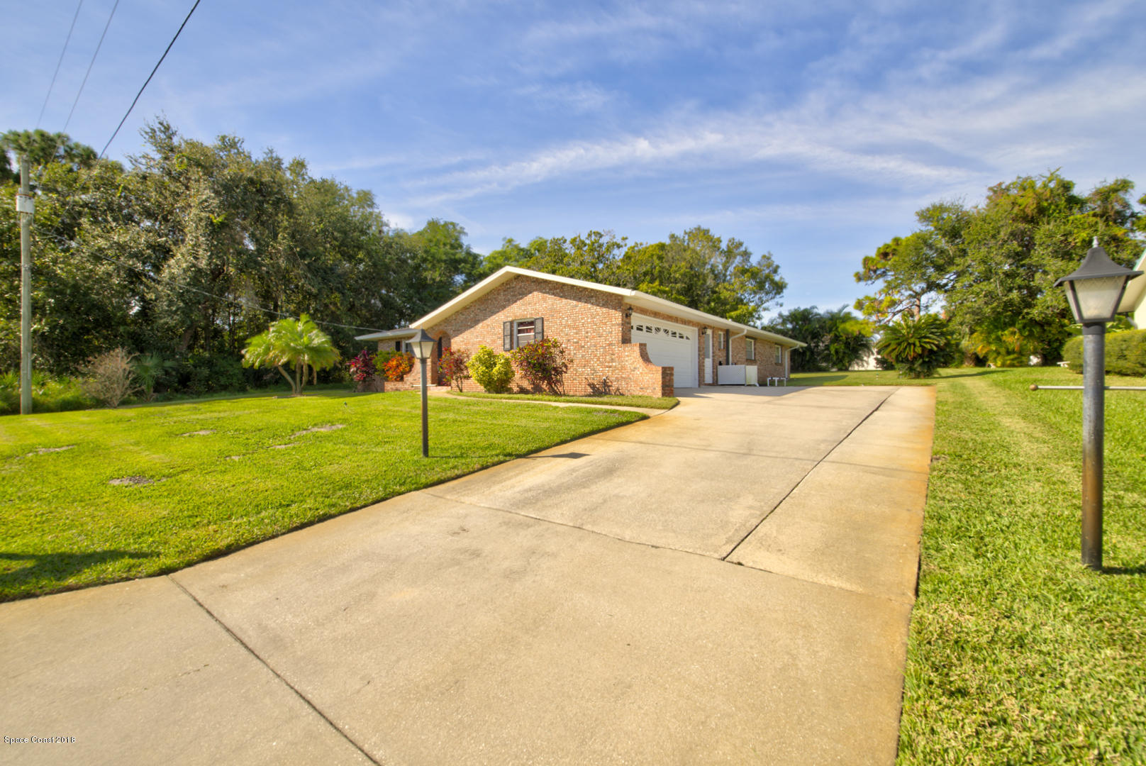 1030 Sunswept Road Northeast Palm Bay, FL 32905 - Photo 4 of 39 front of house right