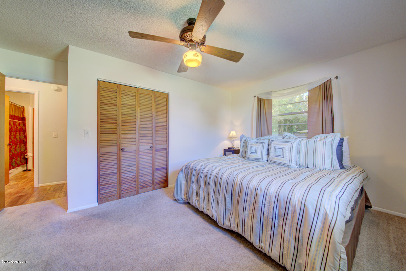 1030 Sunswept Road Northeast Palm Bay, FL 32905 - Photo 34 of 39 bedroom 3 with carpet