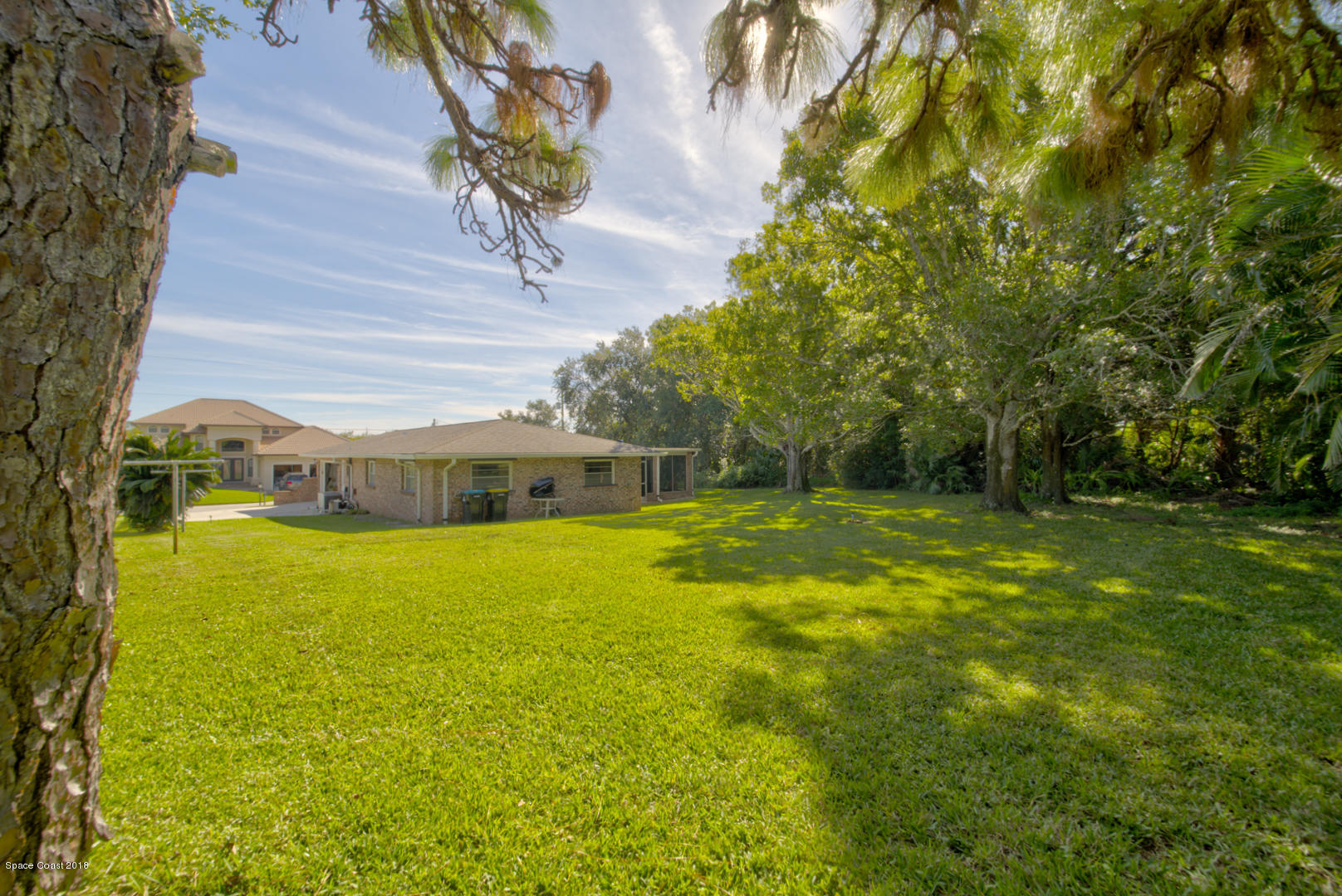 1030 Sunswept Road Northeast Palm Bay, FL 32905 - Photo 36 of 39 back of house left